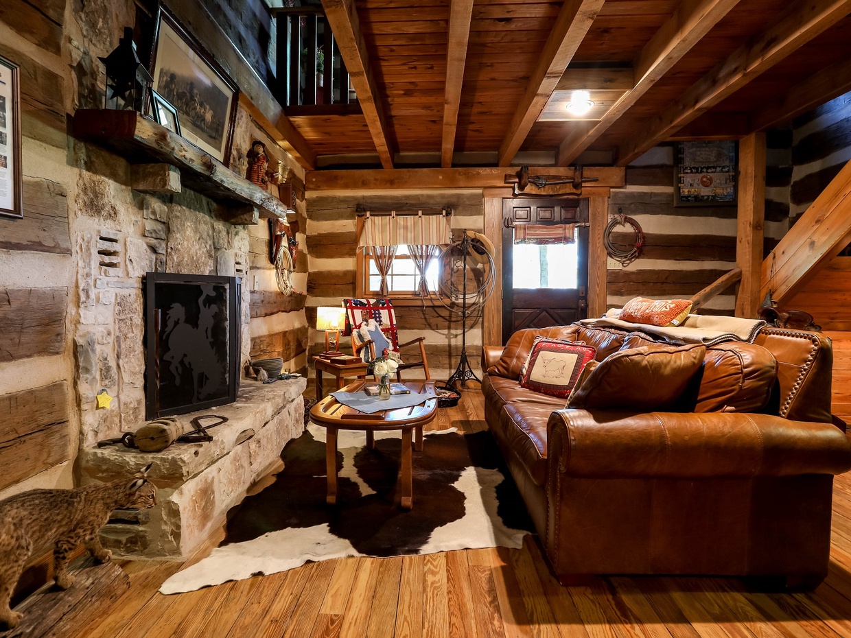Enjoy the supple sofa and a wonderful fireplace