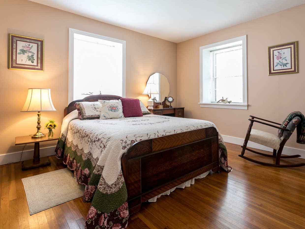 First bedroom featuring a wonderful queen bed