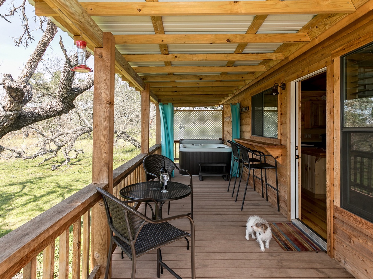 Large porch with a hot tub and grill all to yourself