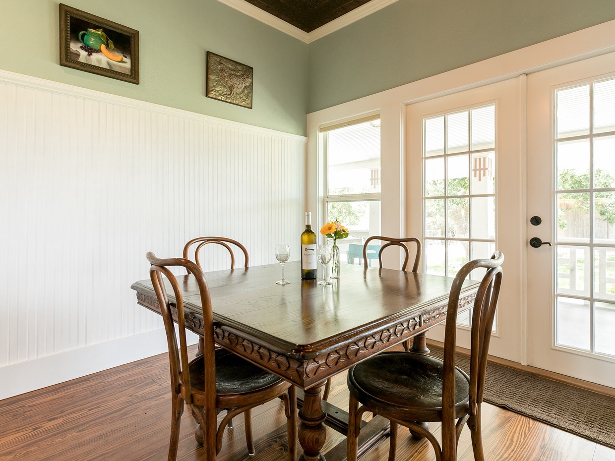 From the front porch, you'll enter the lovely kitchen/dining area