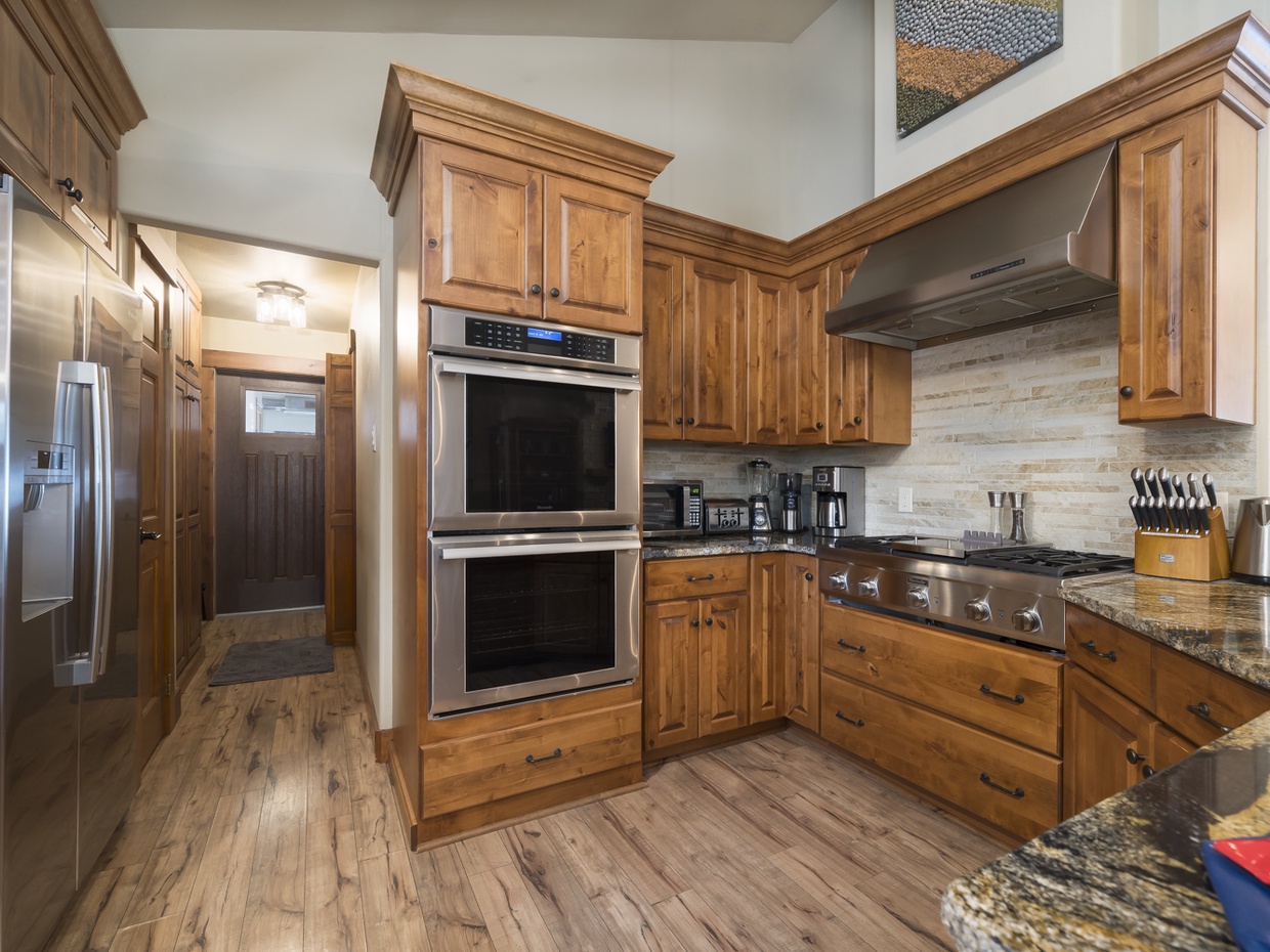 Gourmet kitchen with twin Thermador ovens, dishwasher, microwave, toaster, Thermador range/hood, kettle, coffee pot, cutlery, crock pot, etc...