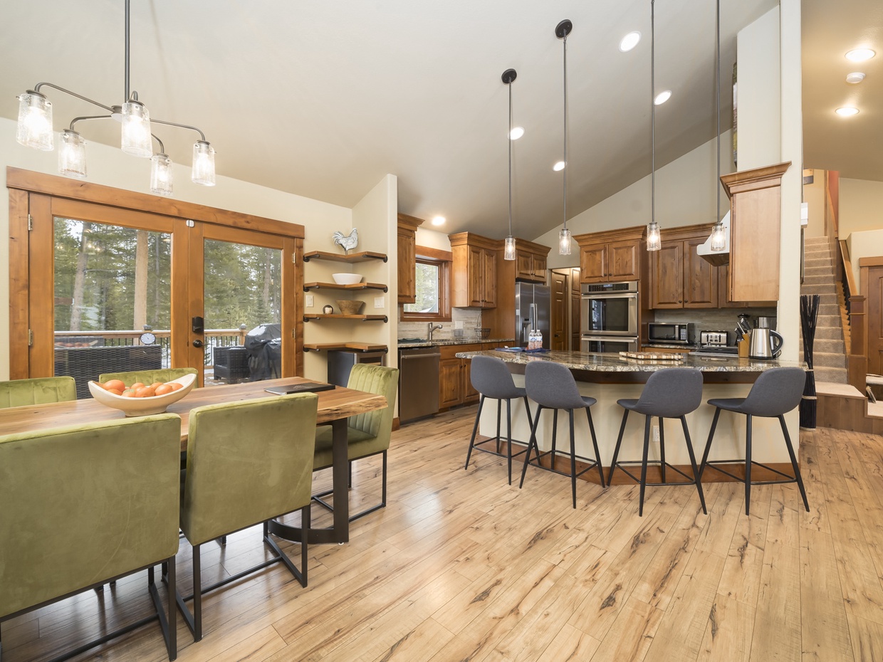 Main floor view of dining room and breakfast bar.