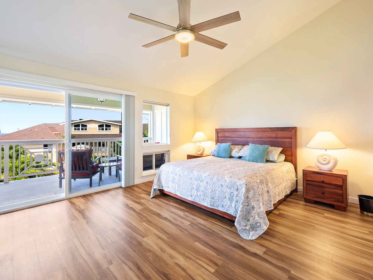 Alii Cove main bedroom has a king-size bed and private lanai with partial ocean view