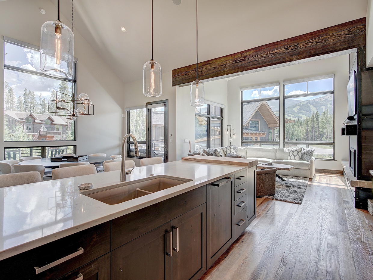 Open kitchen area with beautiful views and lots of natural light.