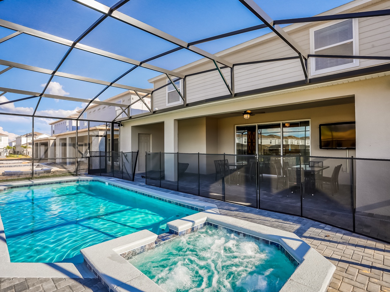 Private pool & spa, covered outdoor eating space, seating area with curtains and TV, complete with pool safety fence