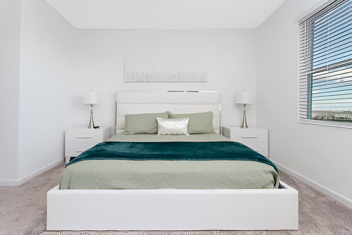 Relax in style: comfortable master bedroom with full private bathroom and access to the balcony/terrace.
