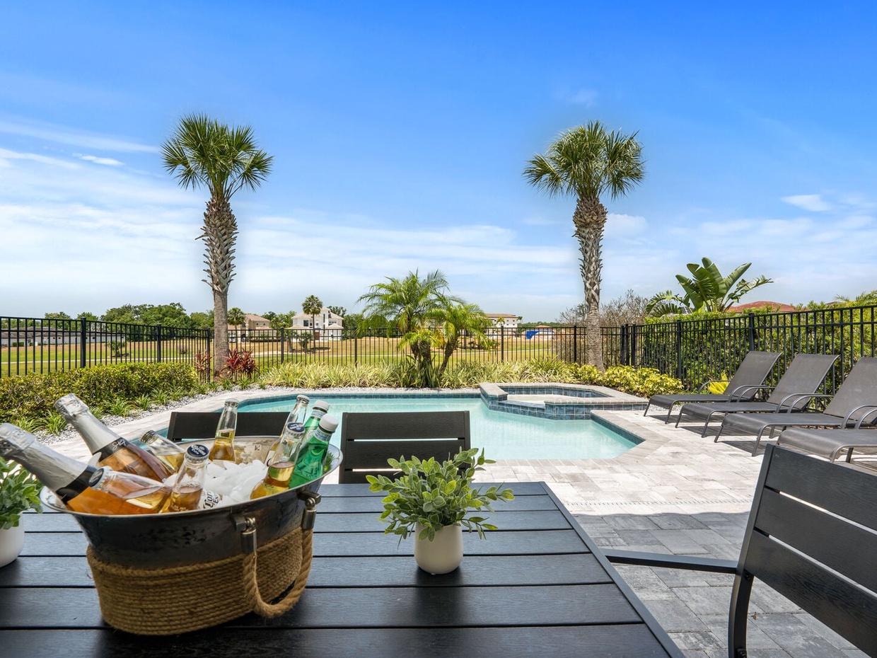 Relax and dine by the pool in style, with beautiful views and plenty of space for outdoor fun.