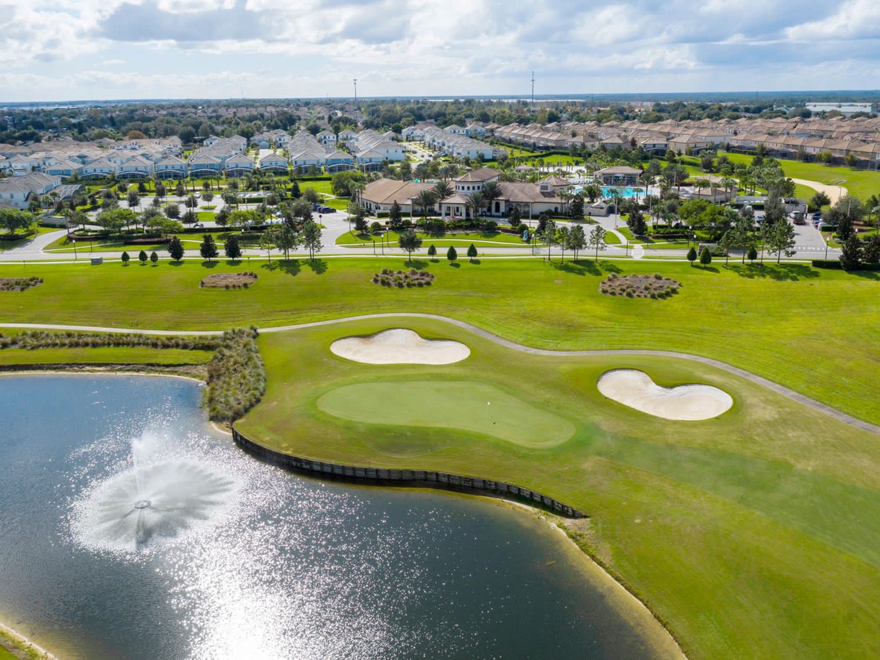 The house is located just an 11-minute drive from Champions Gate Golf Club.