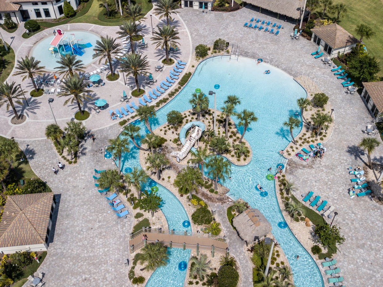 Enjoy year-round fun at The Oasis Club's lazy river, a guest favorite for relaxation and play.