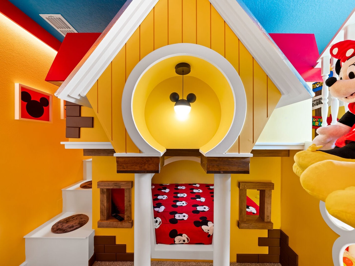 Let your children enjoy the magic of the Mickey Mouse-themed room, where Mickey and his friends bring the fun to life!