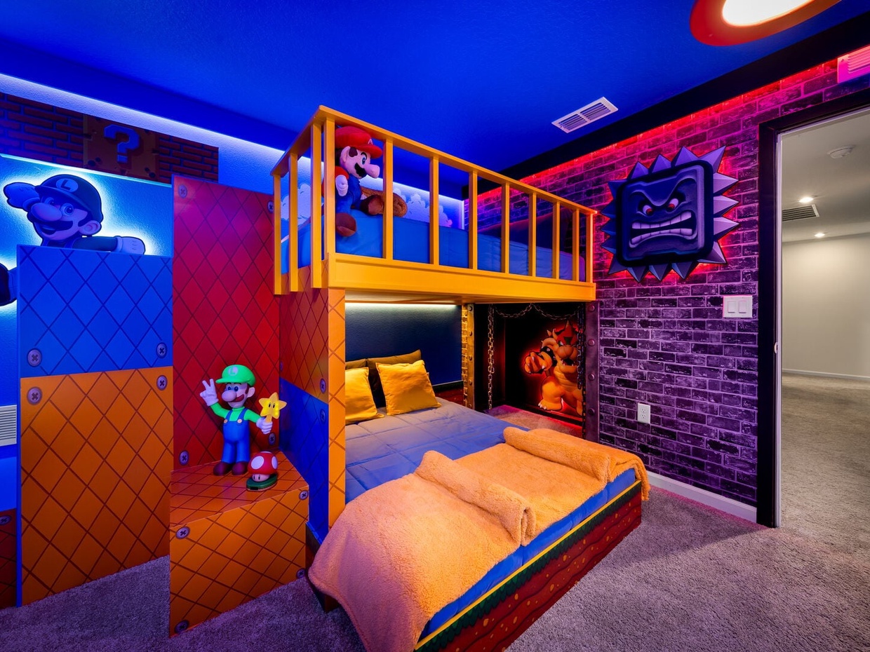 Looking for more adventure? This Mario Bros-themed room lets your little gamers dive into a colorful world of plenty of imagination!