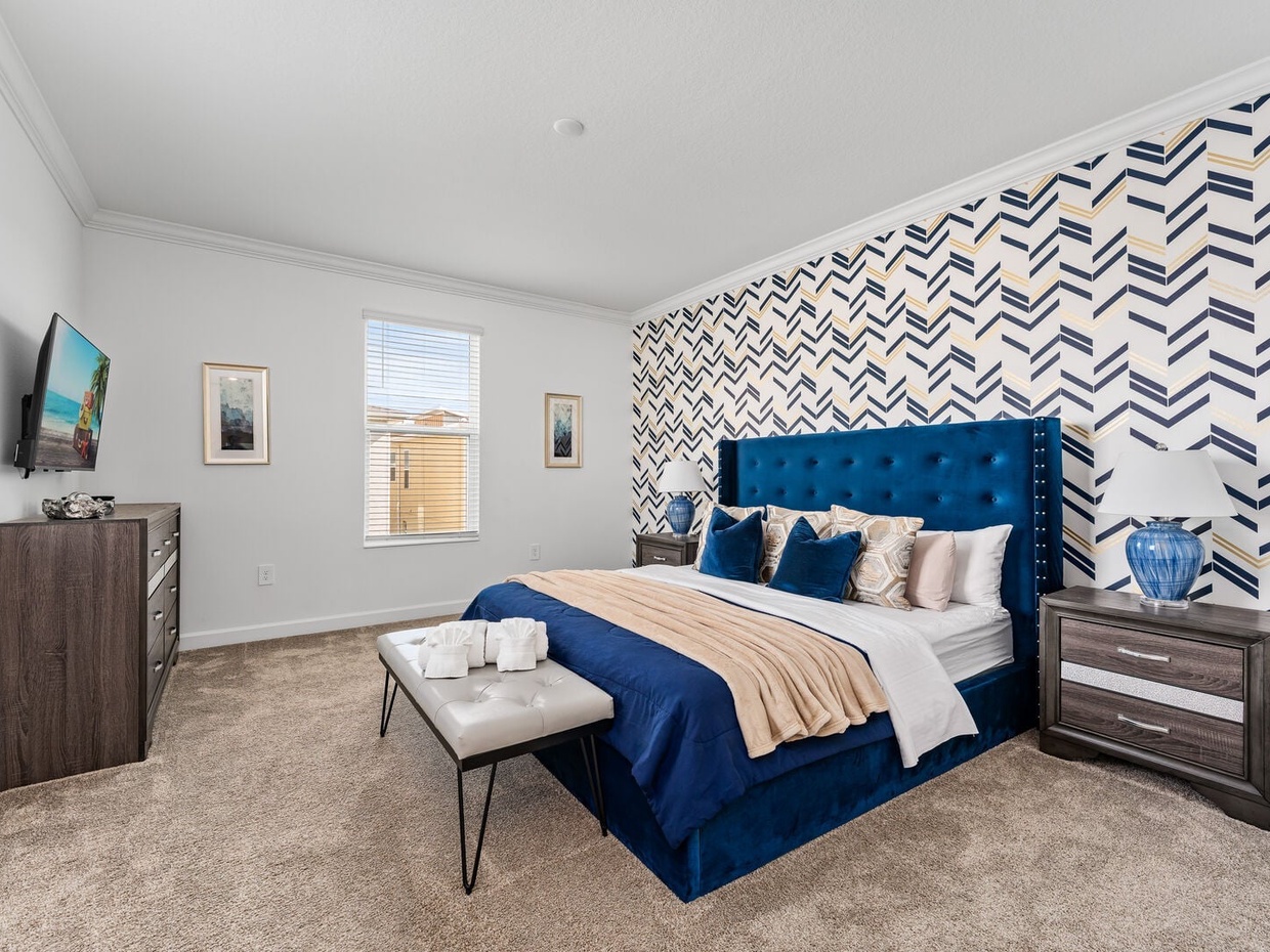 Our master bedroom comes with its own TV, closet, and private bathroom for your convenience.