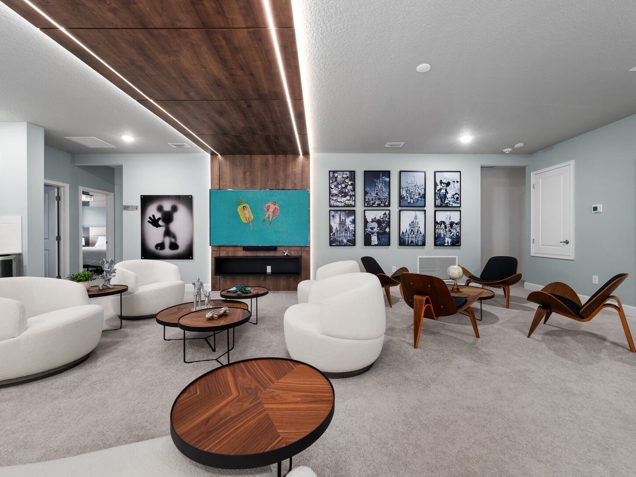 Our loft features a second TV room with a comfortable seating area and a mini bar area for your convenience and relaxation.