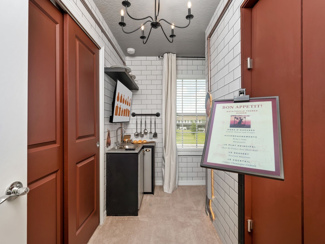 Love Ratatouille? Step into Remy's delicious world with a themed room complete with its own mini kitchen!