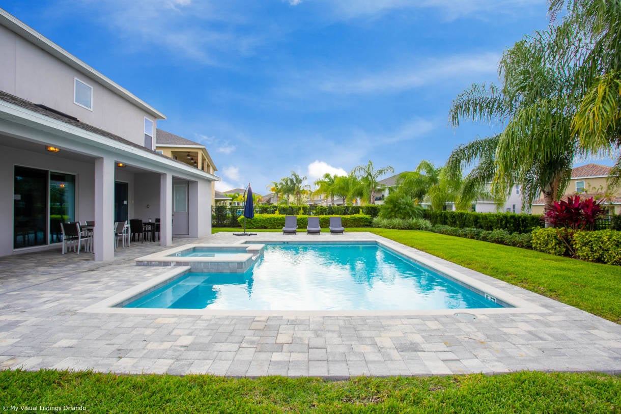 The house features its own private pool, BBQ grill and spacious dining setup to enjoy meals outside.
