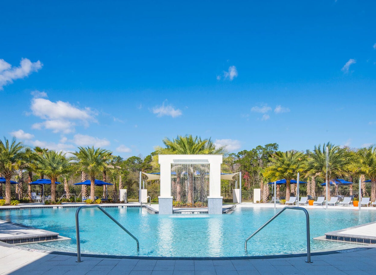 Enjoy the resort-style pool with lounge chairs and cabanas, perfect for soaking up the Florida sun.