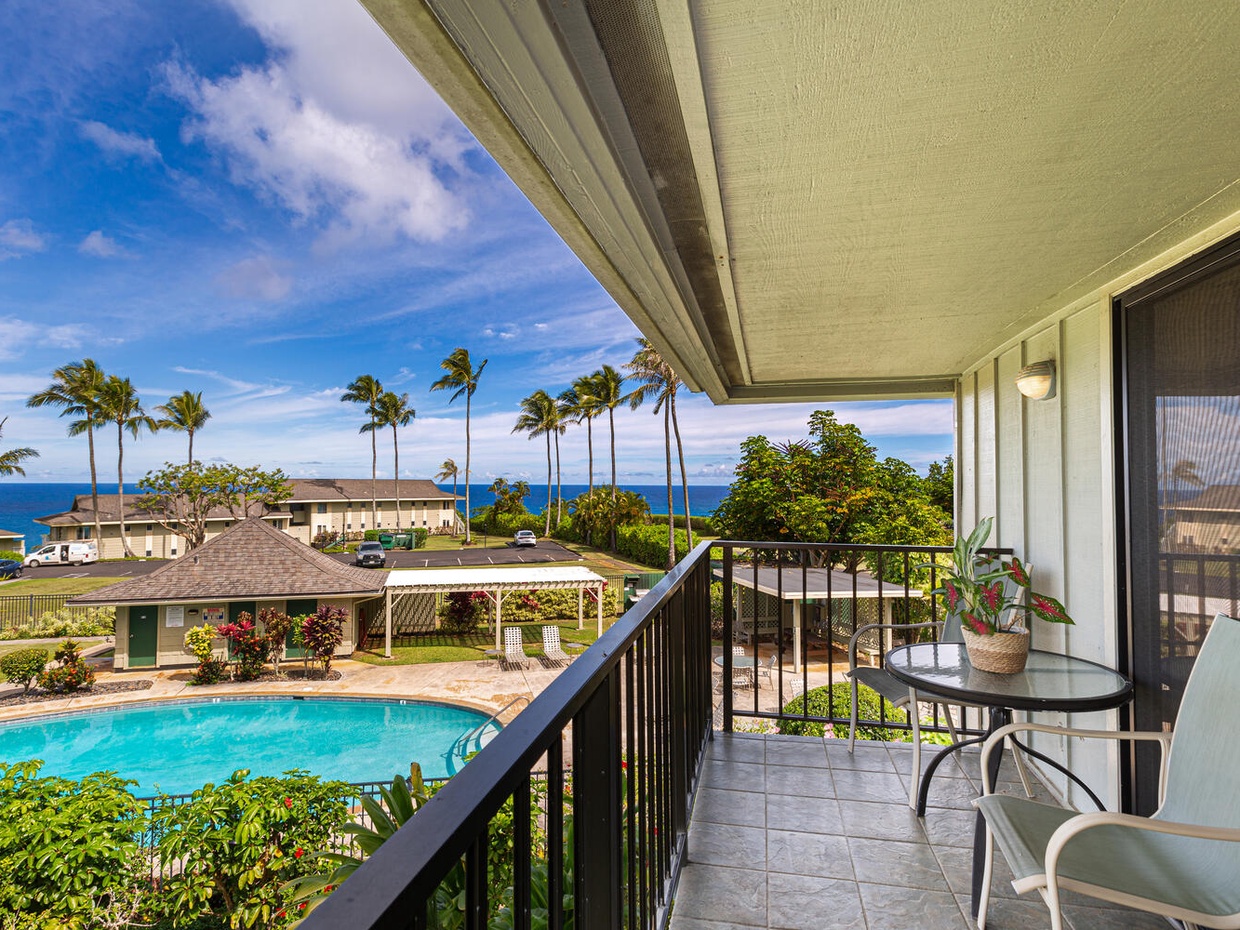 Alii Kai 8H has a private balcony lanai overlooking one of the complex pools and the Pacific Ocean in the background