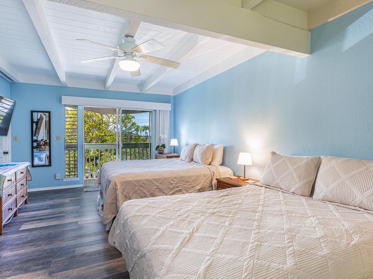 The upstairs loft bedroom has two queen beds, a second private lanai, and a large en suite bathroom. Plenty of room for everyone in your party!