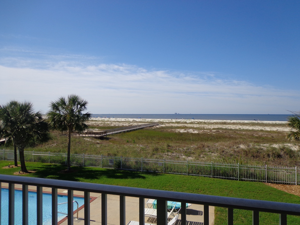 view of boardwalk & beach