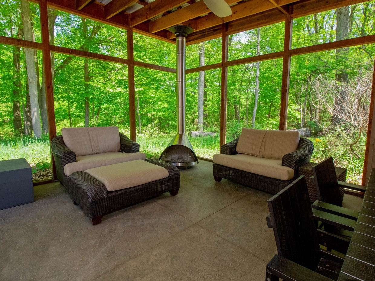 Outdoor Living | Screened Porch With Wood Burning Fireplace