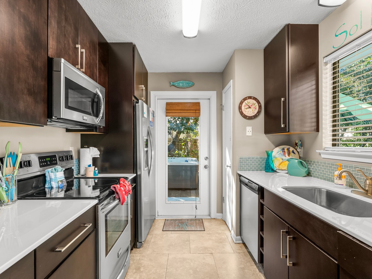 Kitchen is equipped with Stainless steel appliances,dishware and small appliances include coffee maker and Keurig