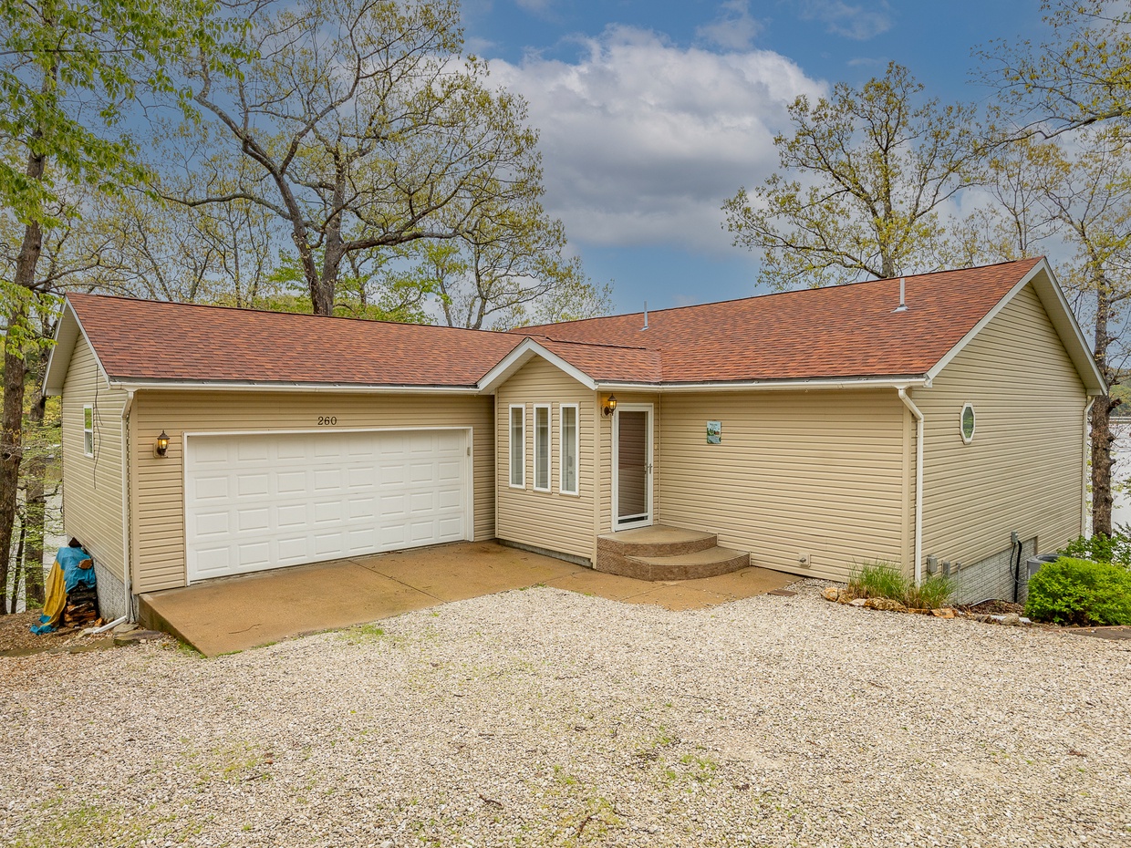 FRONT VIEW OF HOUSE /PARKING