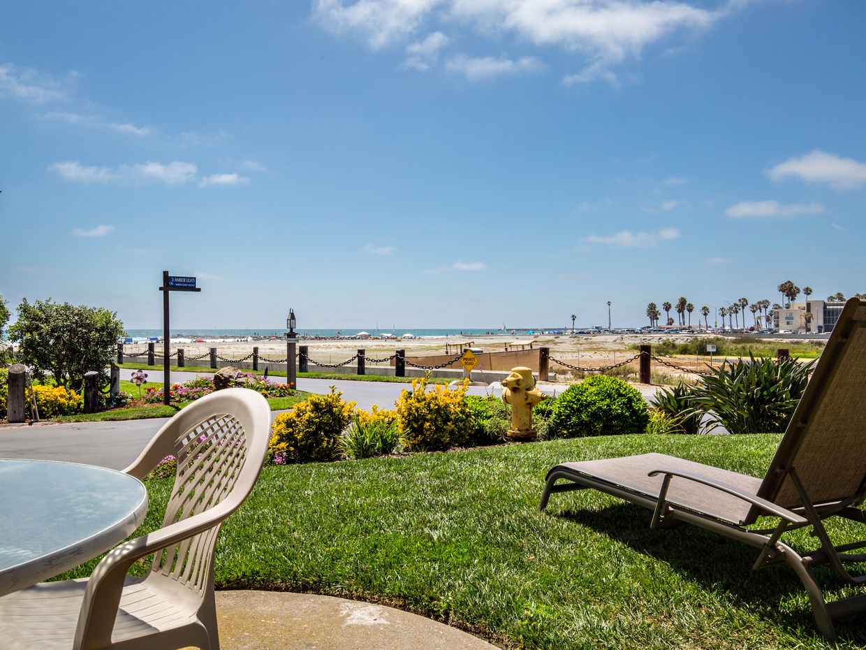 Panoramic views of the ocean, river, harbor, and mountains from your own grassy patio!