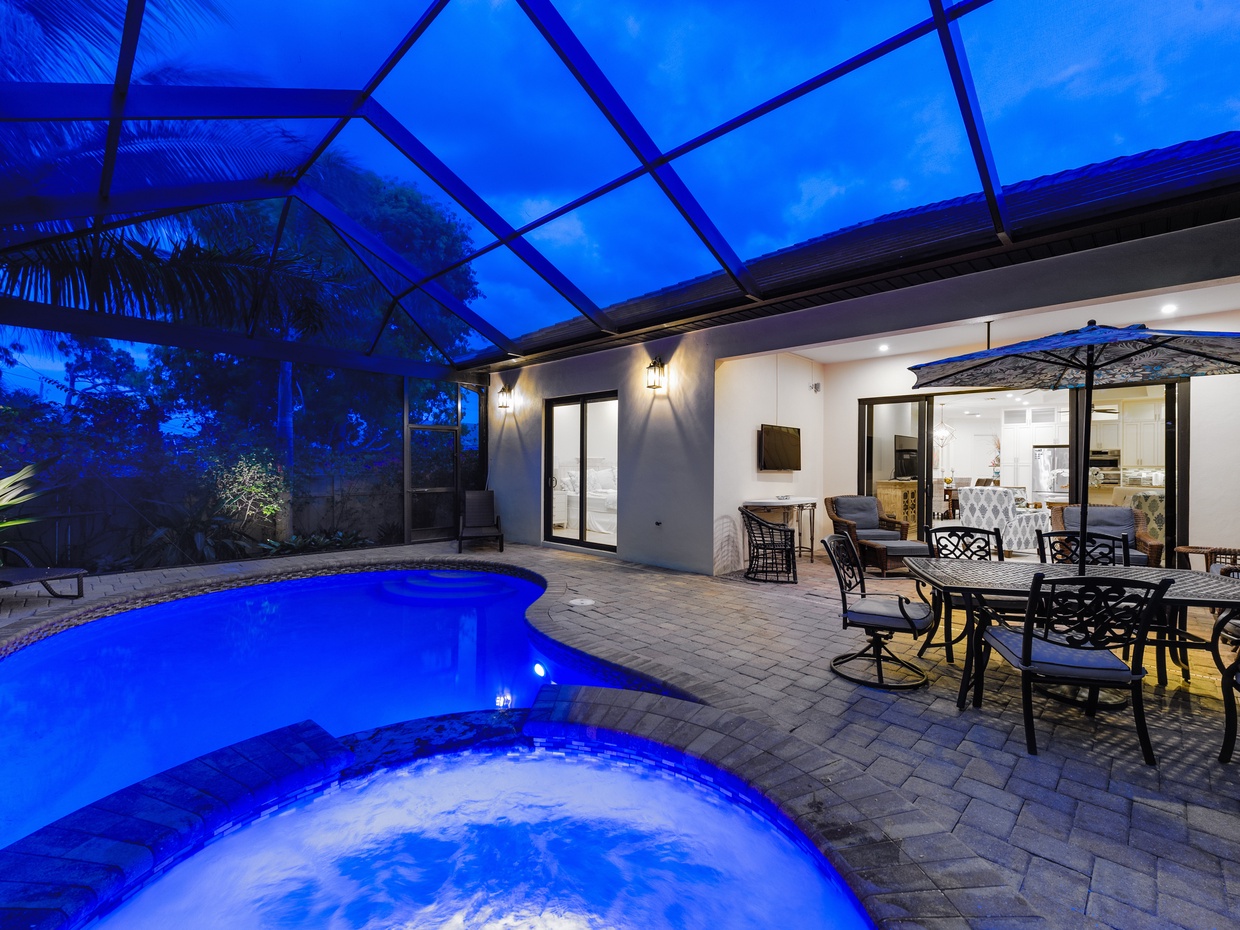 Pool, spa and outdoor dining table