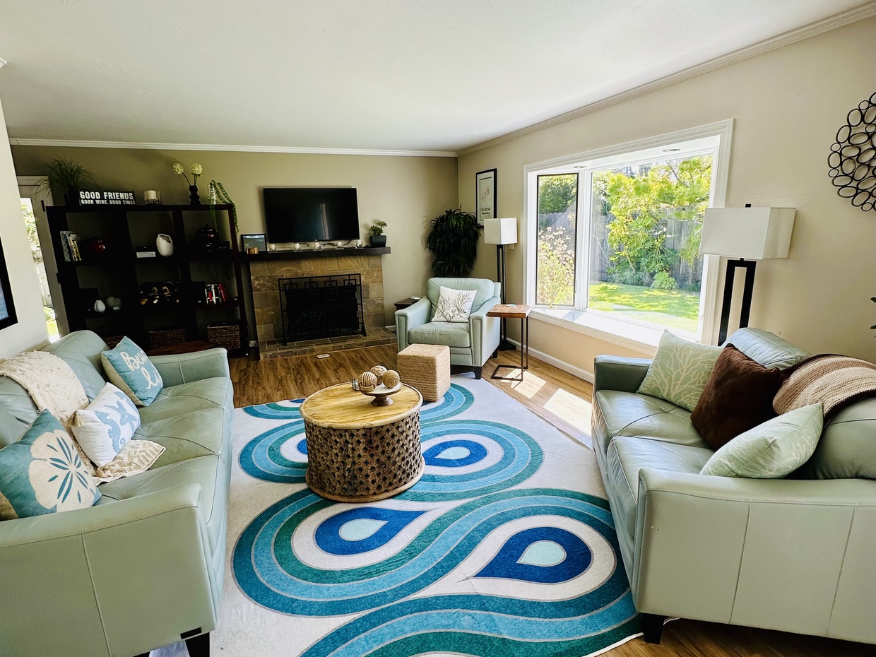 Relax in style with cozy living room furnishings, creating the perfect space for friends and family to come together