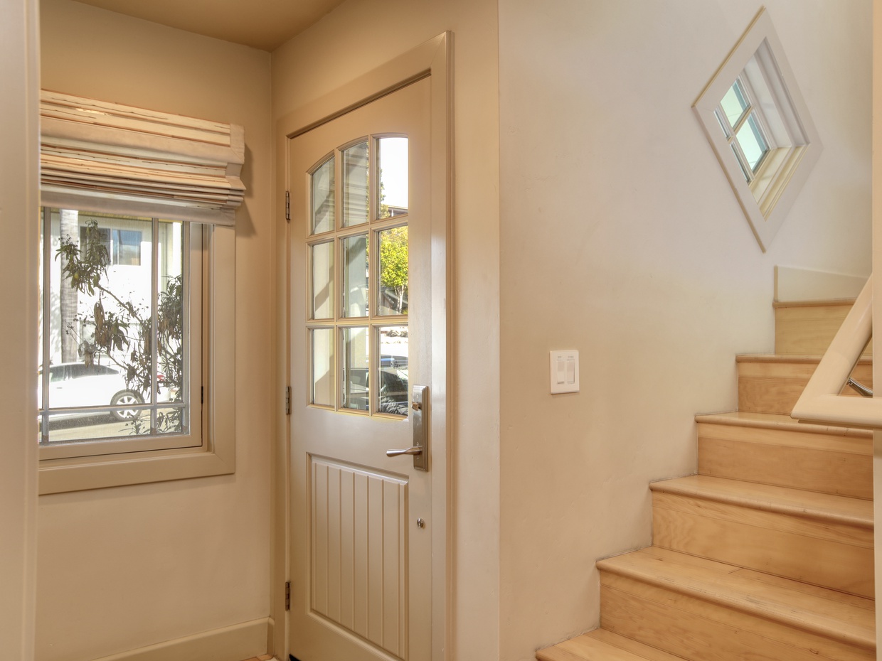 On the street level is the first master ensuite, a cozy retreat. Upstairs, the second level features a bright living area, a fully equipped kitchen, and another master ensuite, offering comfort and relaxation.