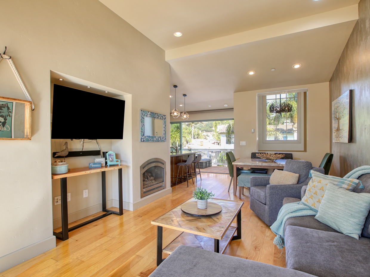 Inside, cozy up by the fireplace or cook up a feast in the well-appointed kitchen.