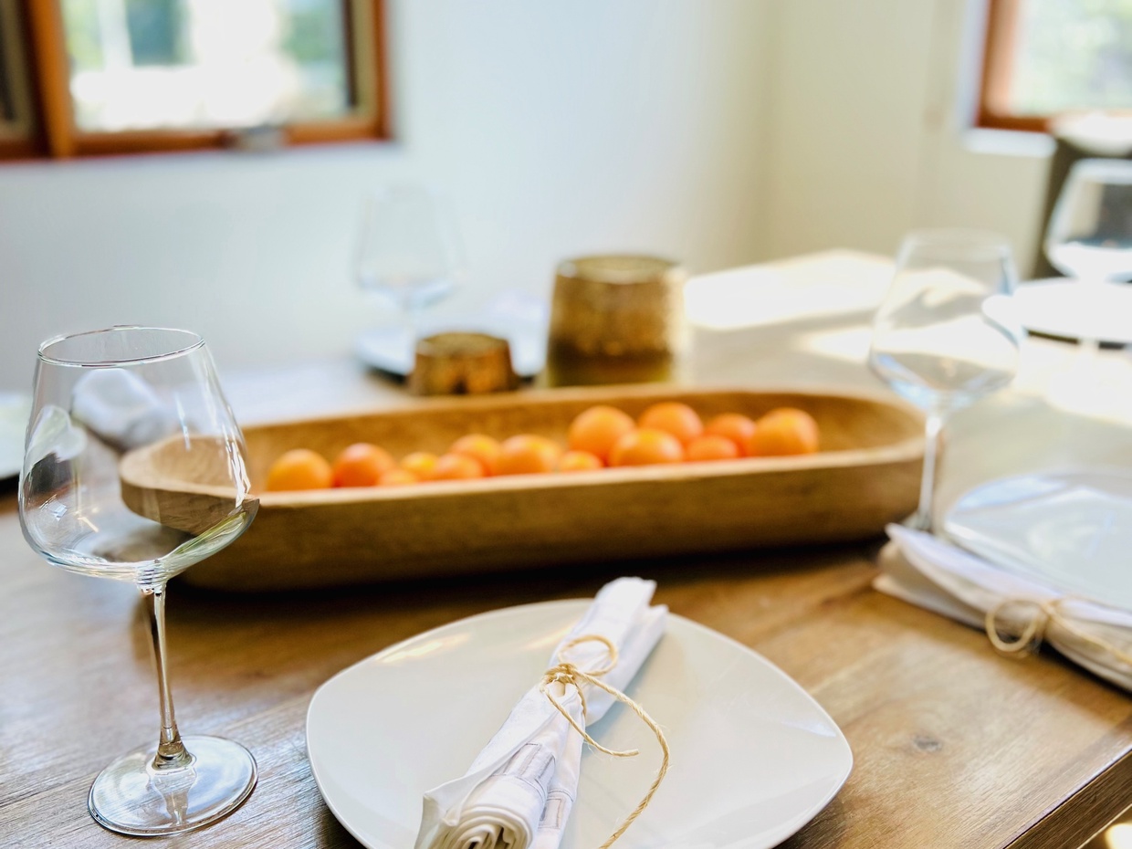 There is a fully stocked kitchen, including a coffee maker, cooking pots, pans, and dish ware to serve a family of 8 guests.  