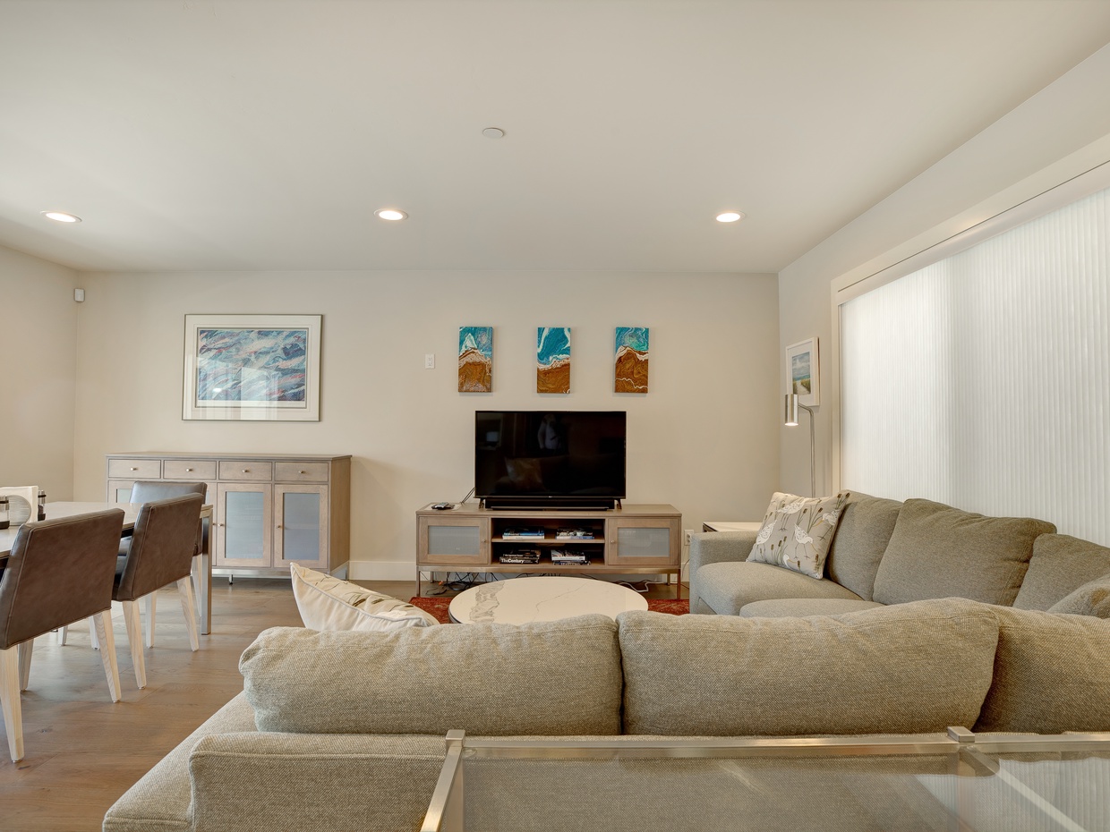 Gather friends and family around the sectional seating. TV is a SmartTV with Charter/Spectrum basic cable stations.