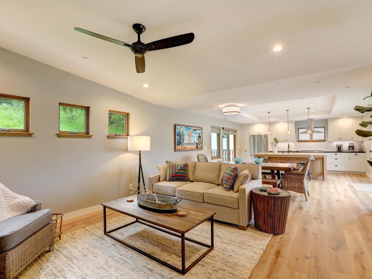 Open space living, dining and kitchen. Located on second floor.