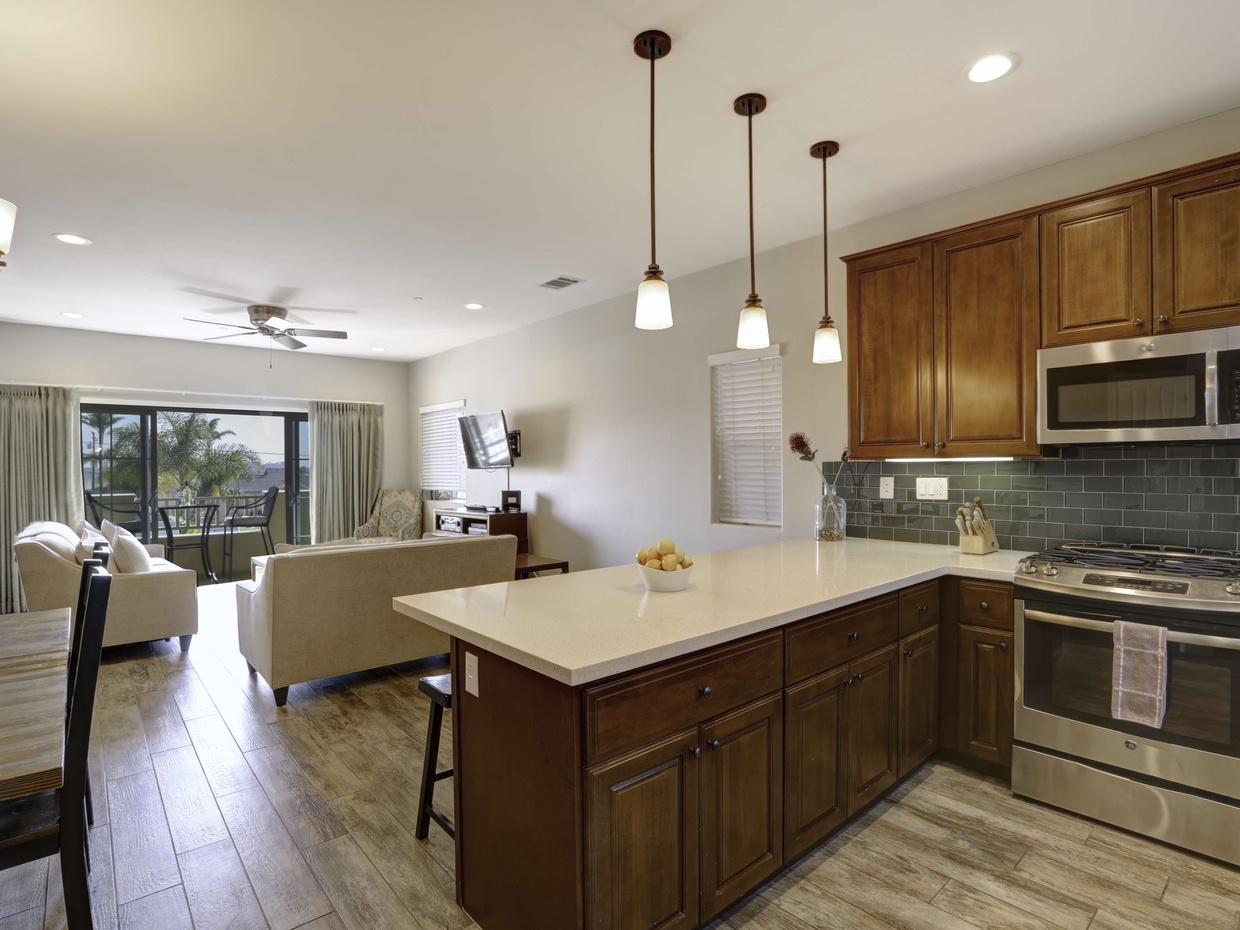 Primary living area is on second level. Living room, kitchen and dining. Dining table for 6 plus bar stools.