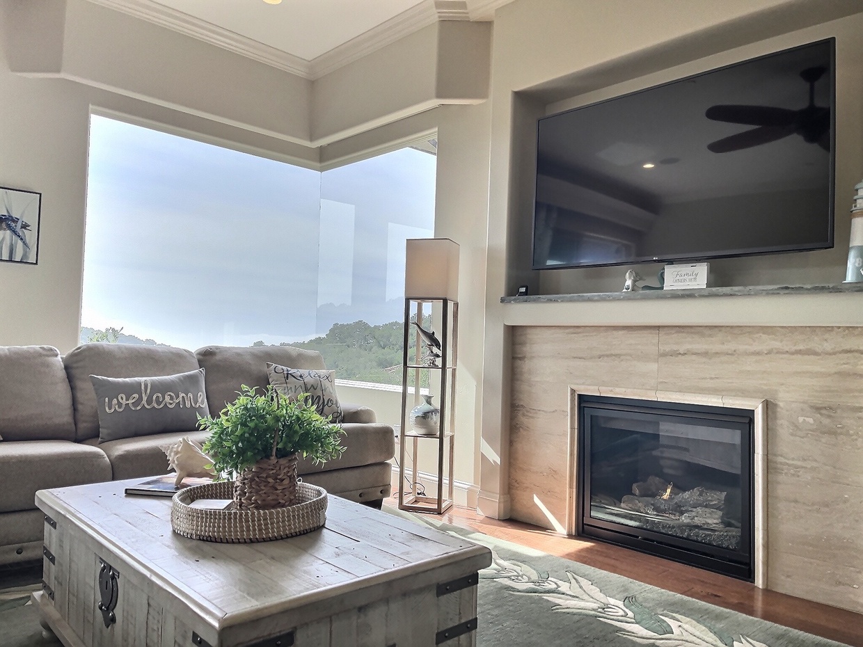 Relax by the fireside as the ocean fog rolls in.