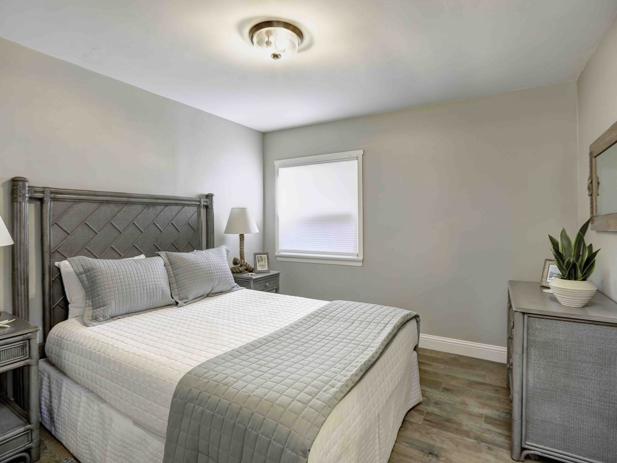 Lucky One has two bedrooms, both have queen beds.  The bedroom has 2 night stands, Tuft & Need queen bed mattress and a 3-drawer dresser.
