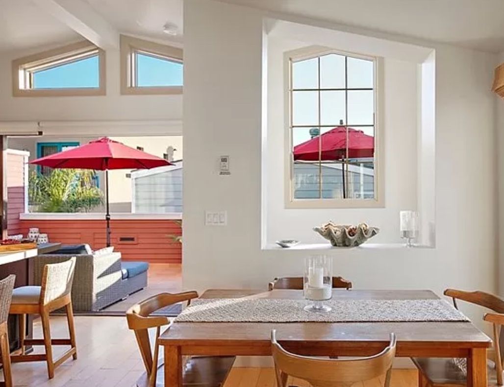 Gather your friends and family around this sunny dining table. 