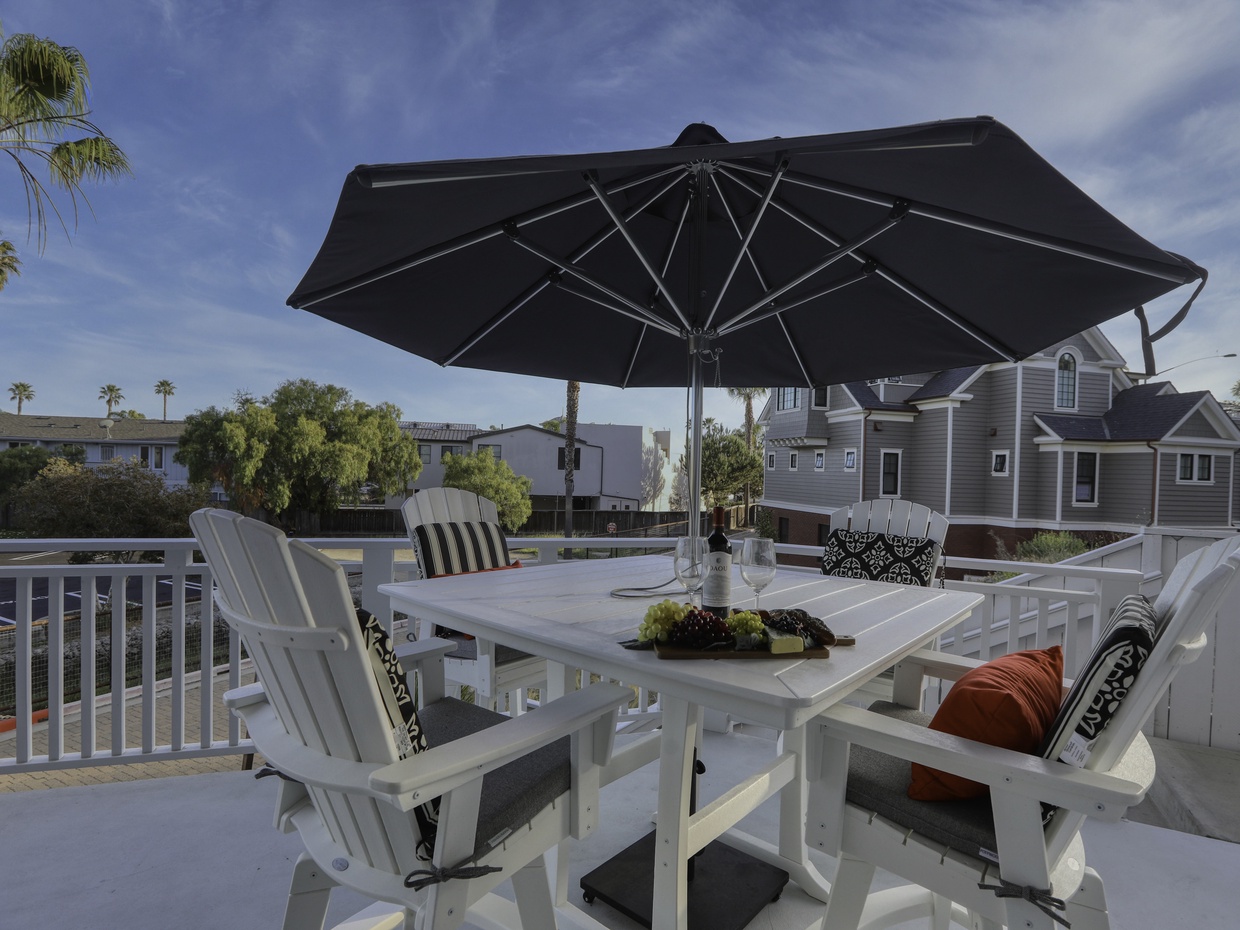 The main deck terrance has amble seating for friends and family to gather. From the main terrance there are ocean views.