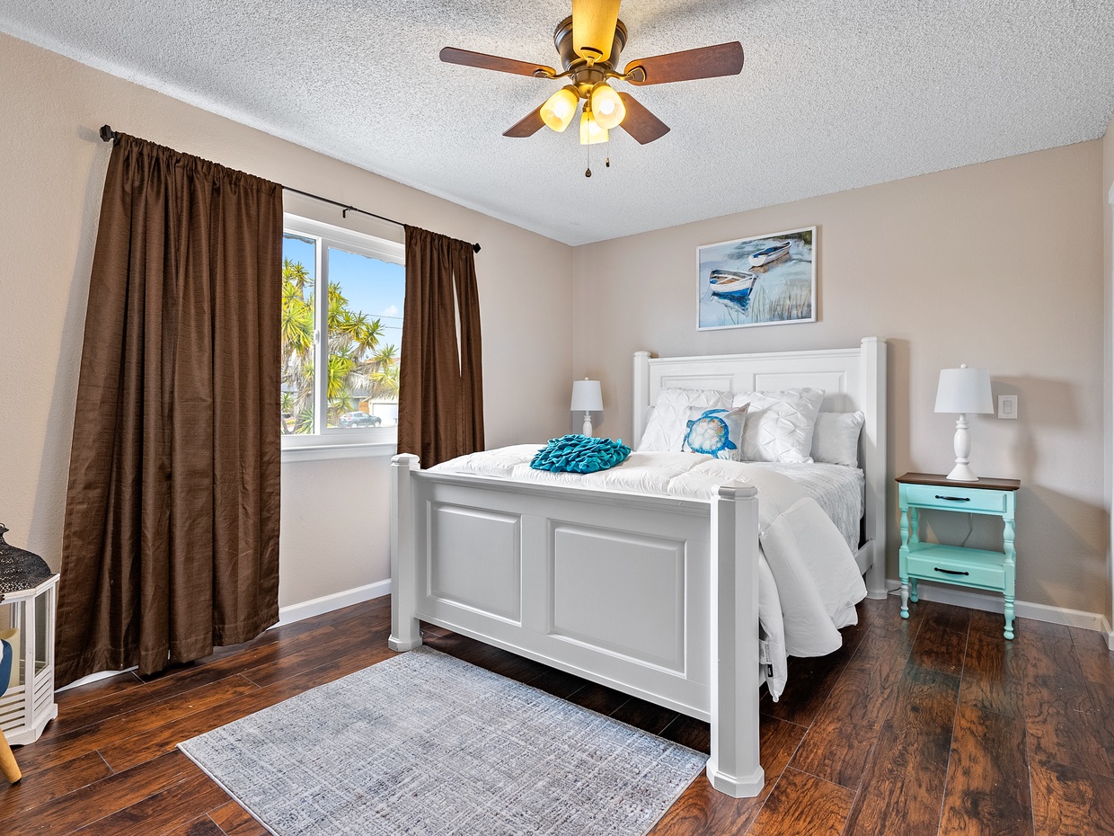 Master bedroom has a queen bed. The master bedroom is located on the second level.