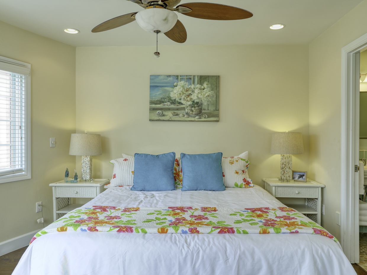 The beach condo has two master en-suites. Pictured is the master suite on the upper level.

Stay up late to finish a captivating read in king size bed.

Need additional sleeping to a young child? The owner has a tri-fold sleeping mattress.
