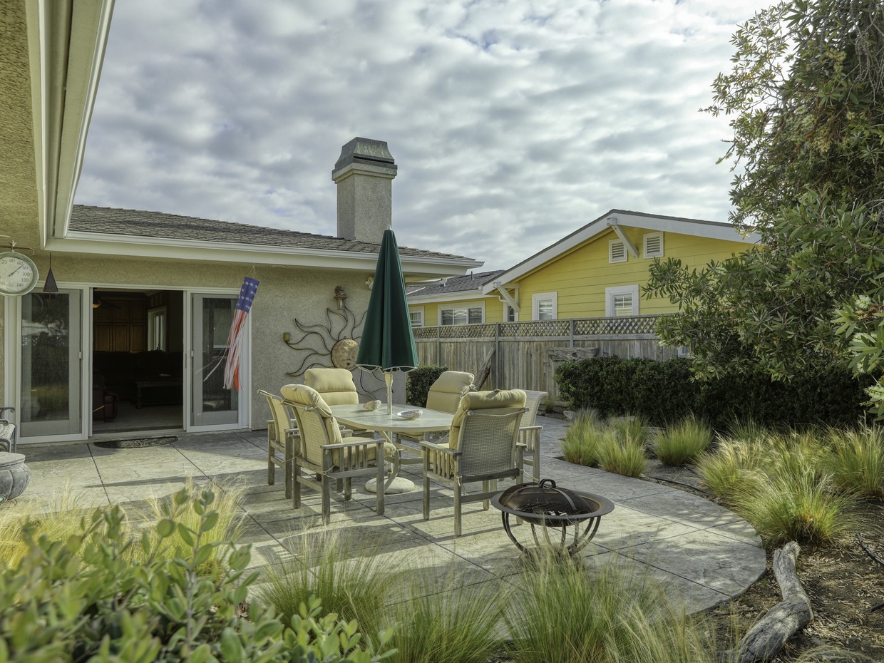 An intimate cafe setting in your private backyard. Outdoor dining for six guests, and nearby wood burning fire pit to keep you warm on chilly beach evenings.
