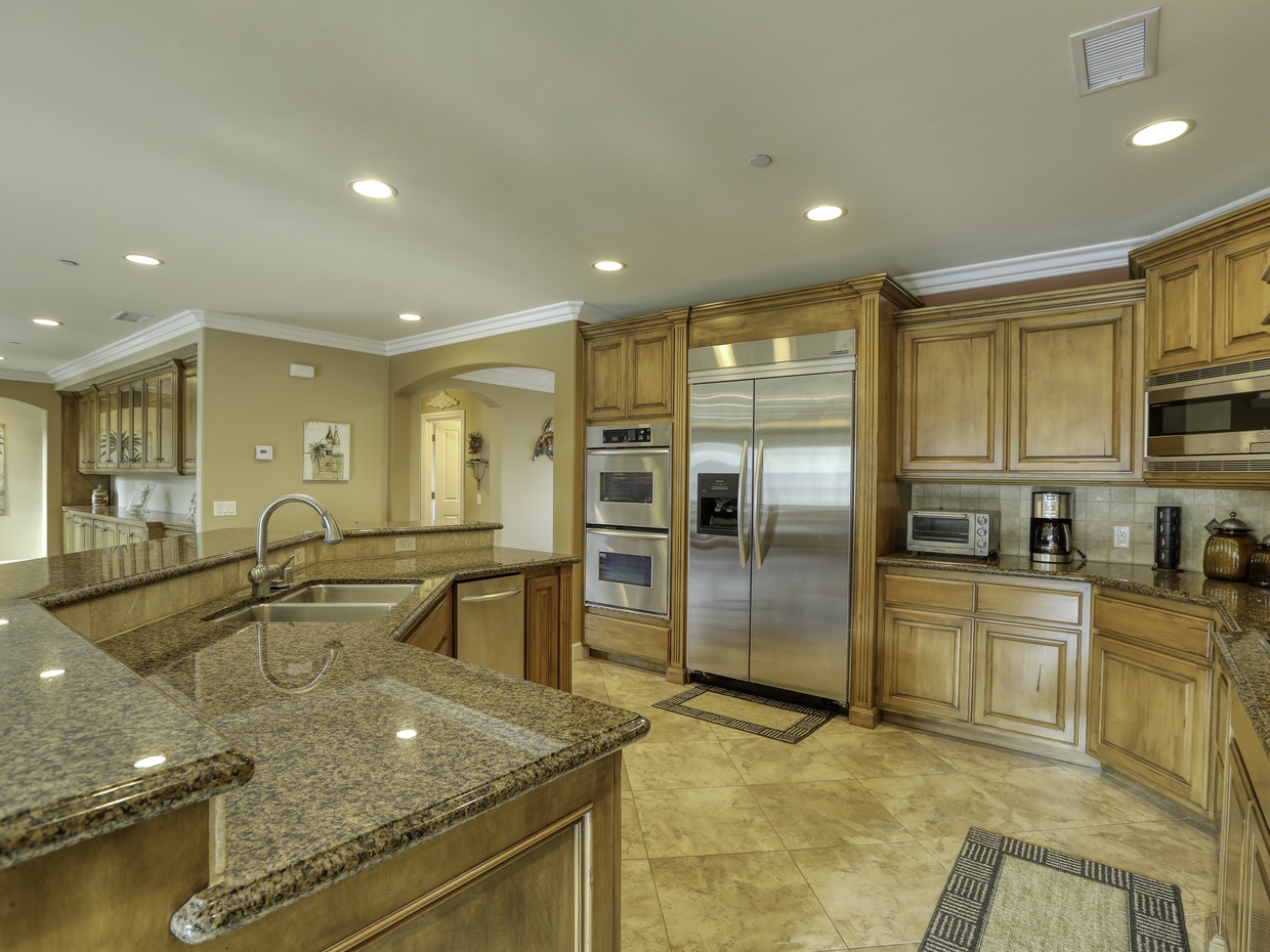 The granite kitchen island and countertops offer generous space to prepare your daily catch, while sampling a California Central Coast wine pairing.