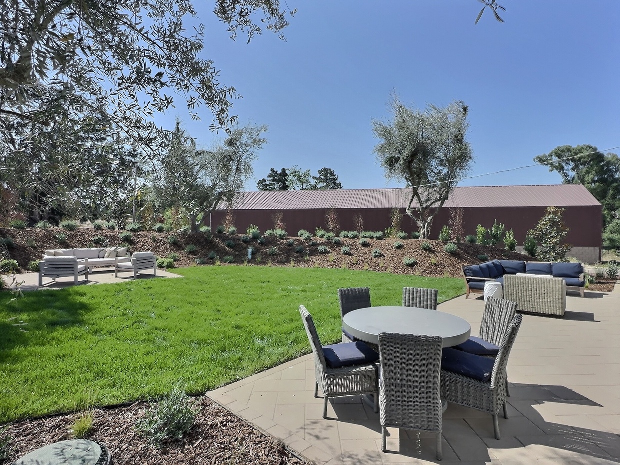 Whether relaxing indoors or enjoying the beautiful outdoor setting, this great room is designed for comfort and enjoyment.