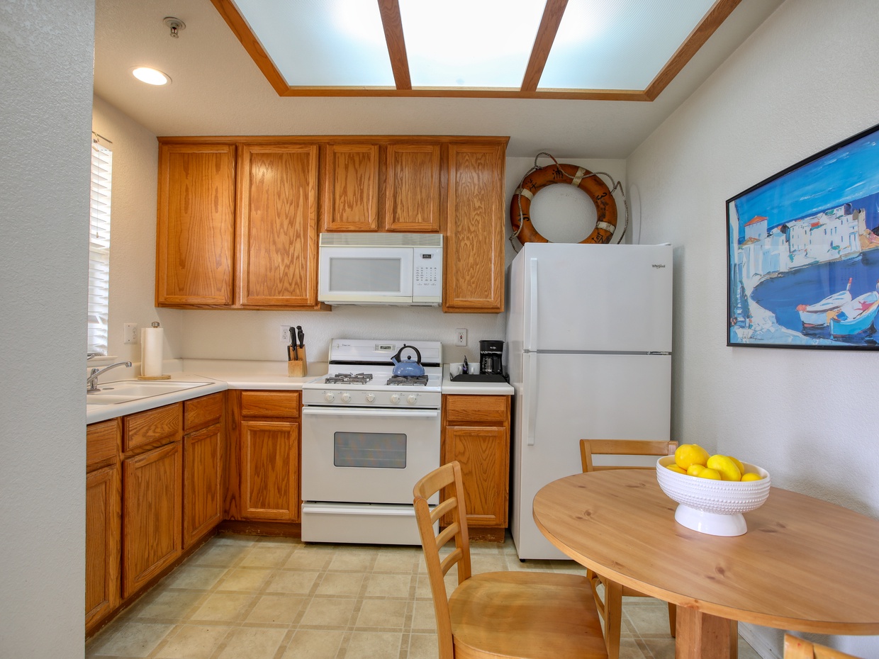 Start your day right — fresh coffee and a sunny kitchen await.