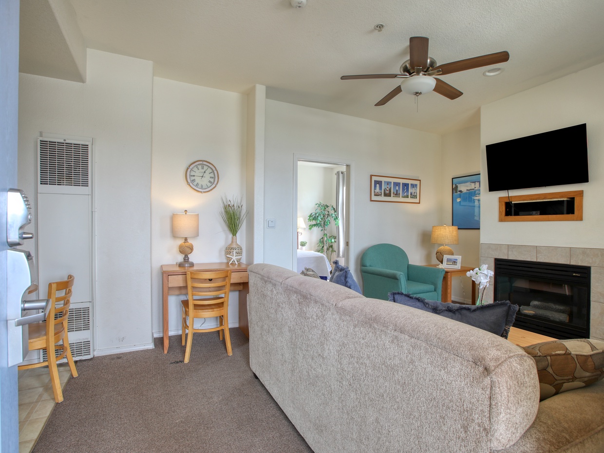 A living room made for laughter, lounging, and late-night snacks.