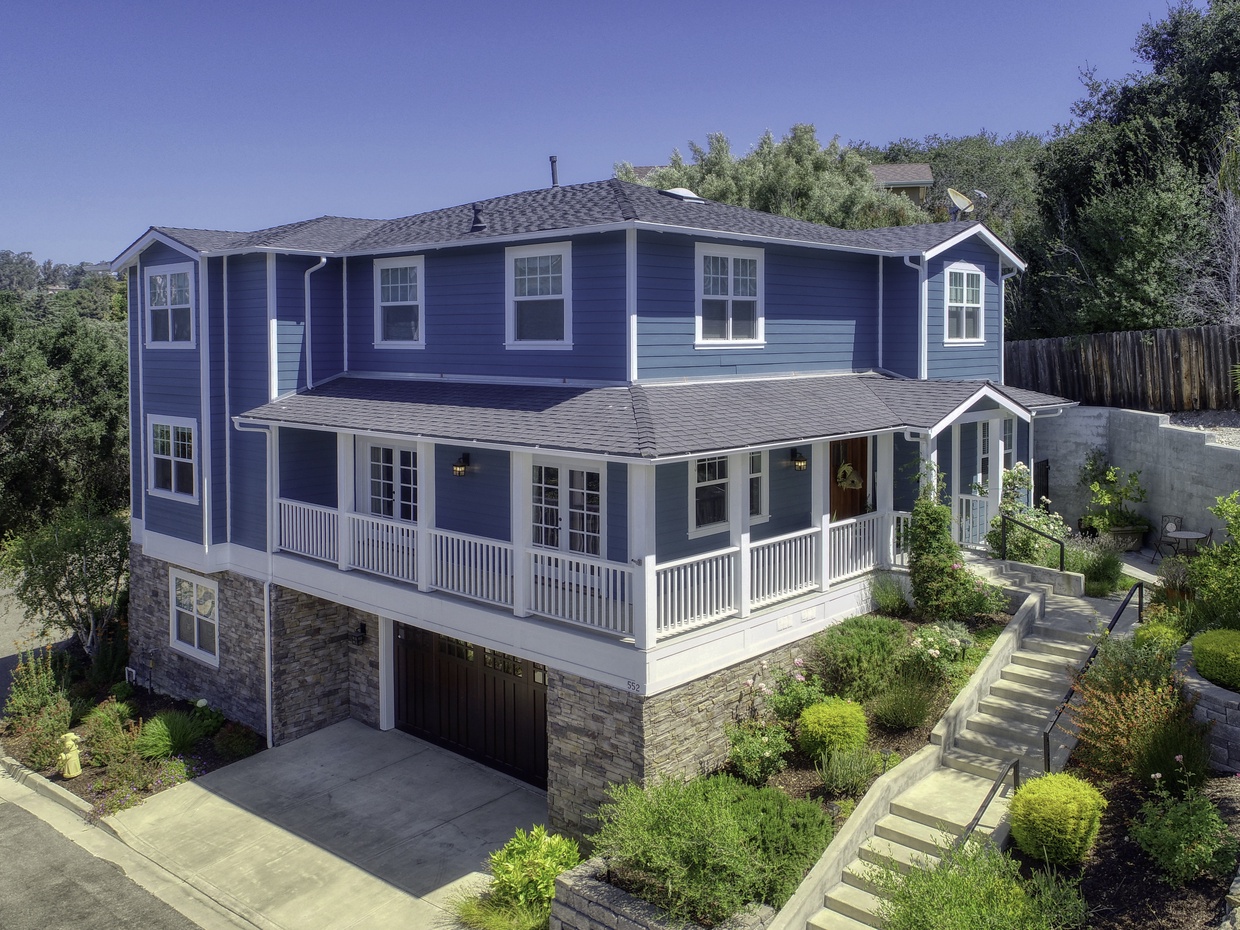 Discover Paseo del Sol in Arroyo Grande. Located just moments from the historic Village, this private home sits on a hillside, offering a peaceful sanctuary. Imagine mornings spent breathing deeply as you overlook a canopy of ancient ocean oak trees. This retreat isn't just a home; it’s an experience with natural beauty, and secluded luxury.