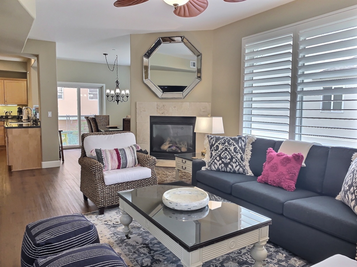 Fresh and bright new living room attire. Sofa makes into a KING memory foam bed.