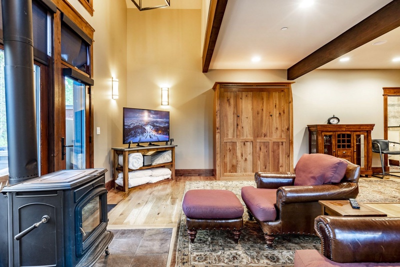 Murphy bed is in the brown armoire.