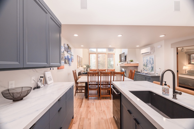 Look out into the living room while preparing meals